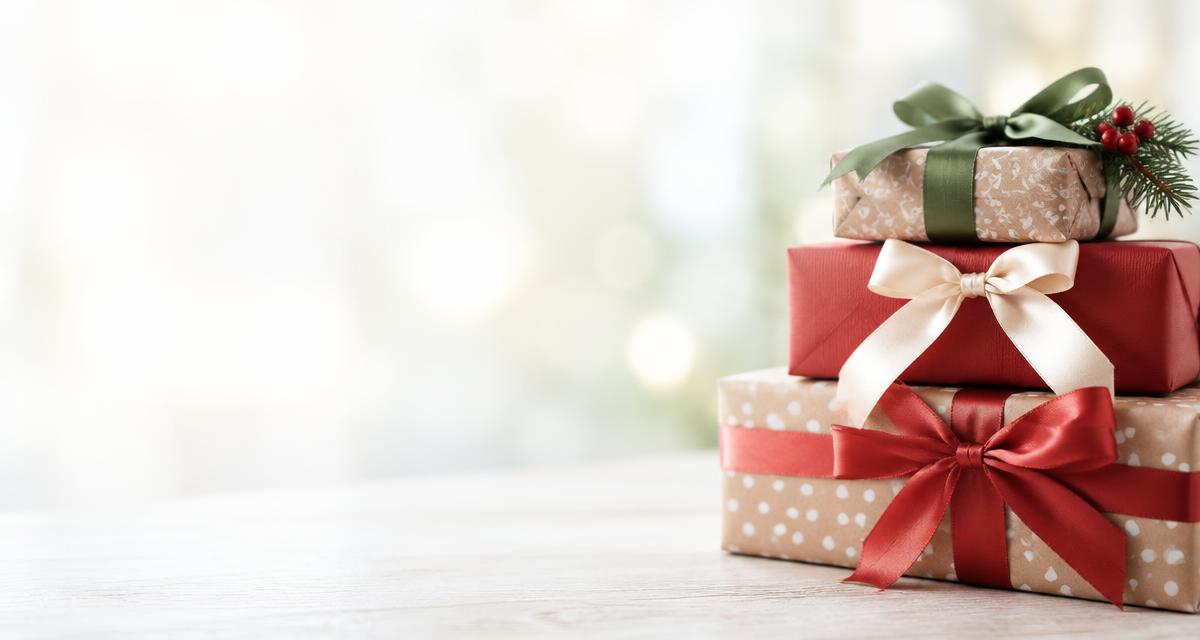 Stacked wrapped gift boxes with ribbons